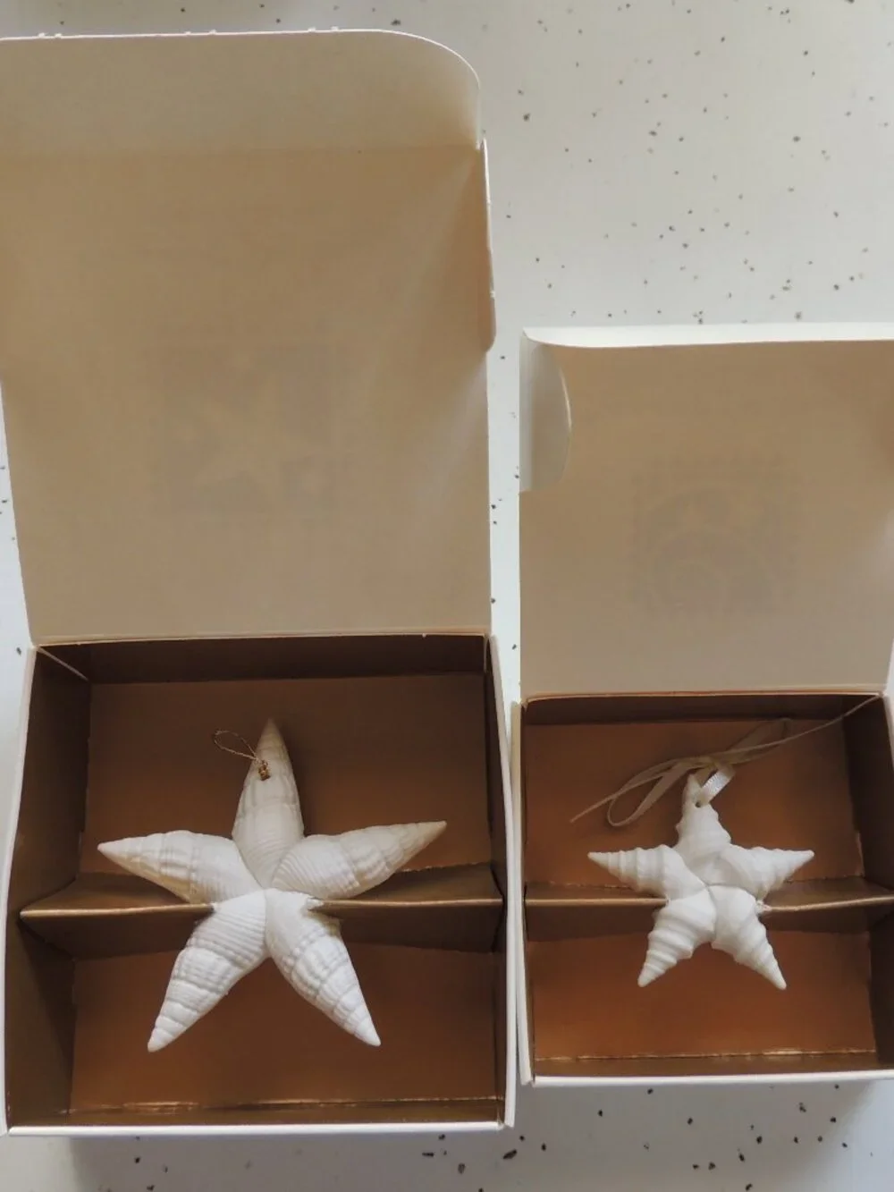 TWO Margaret Furlong star ornaments